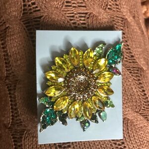 Elegant Sunflower Brooch with Yellow and Green Crystals